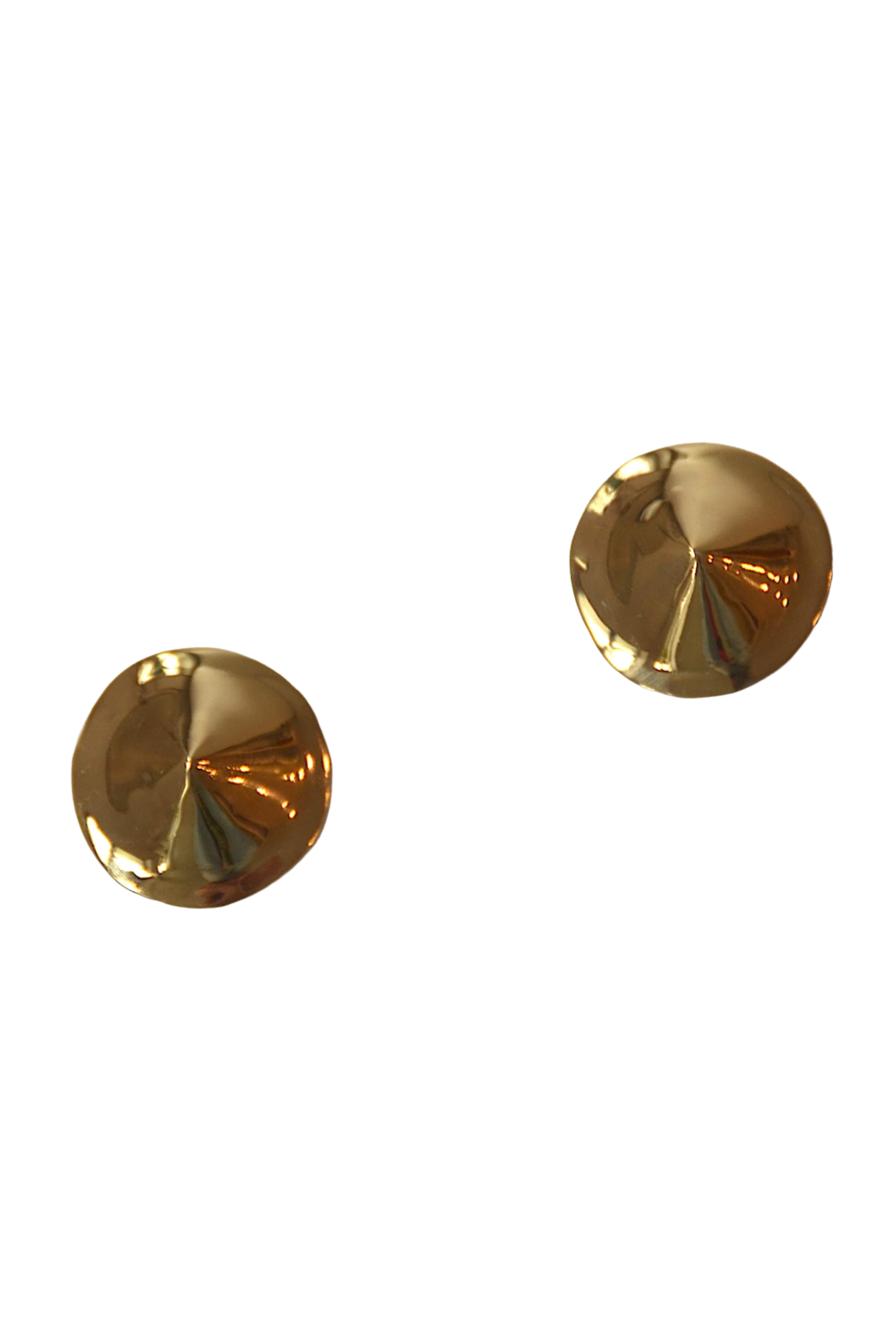 Two gold pasties on a white background
