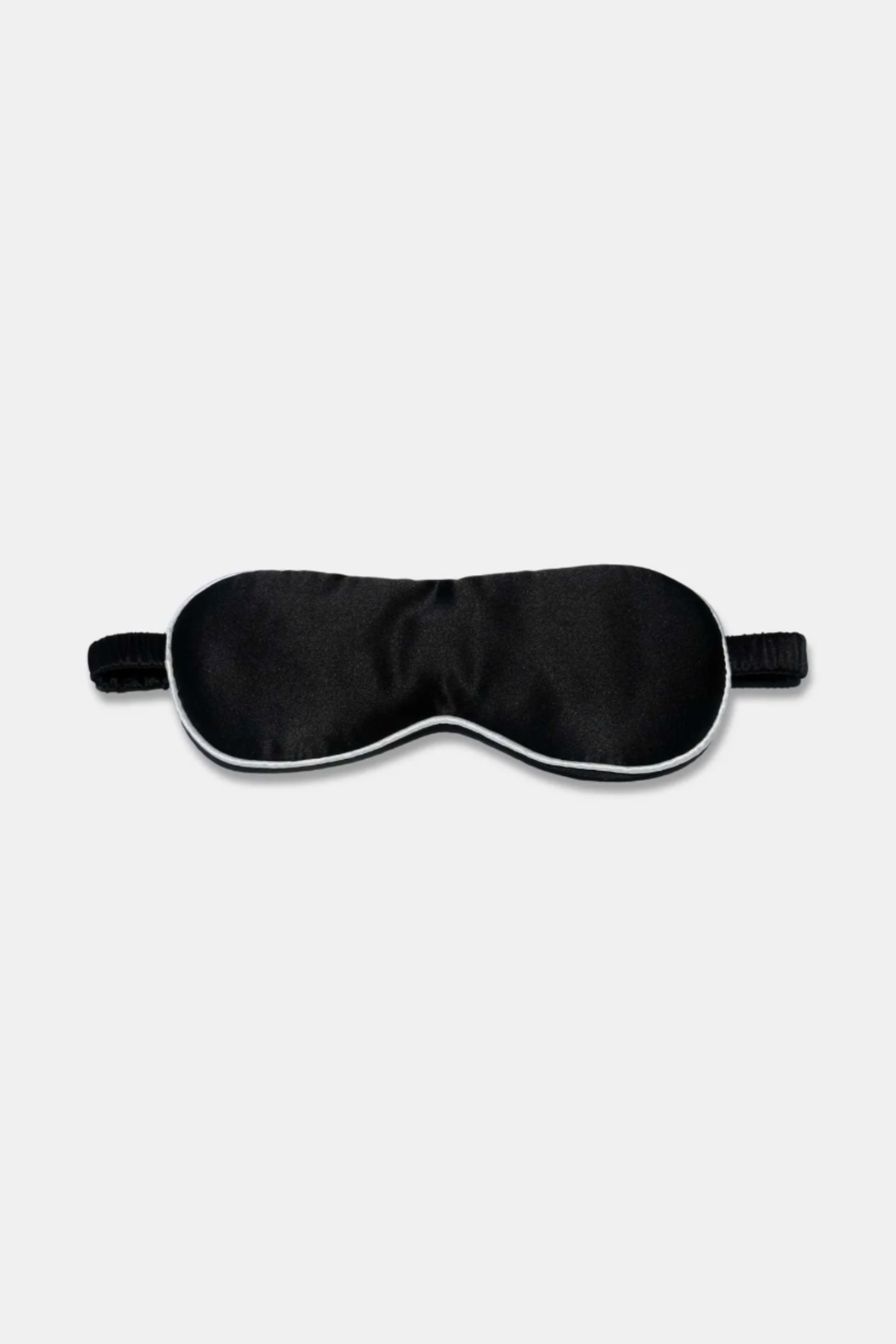 Black sleep mask on a white background